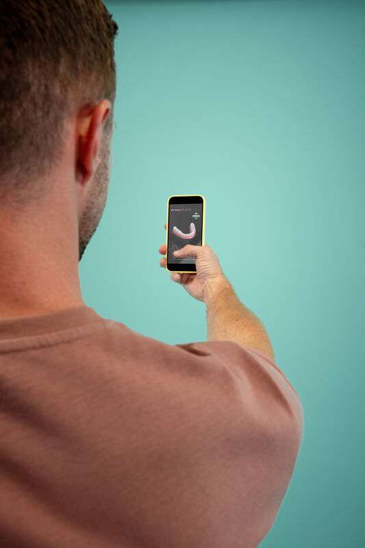 Desktop - Man - Phone - Blue Background - App